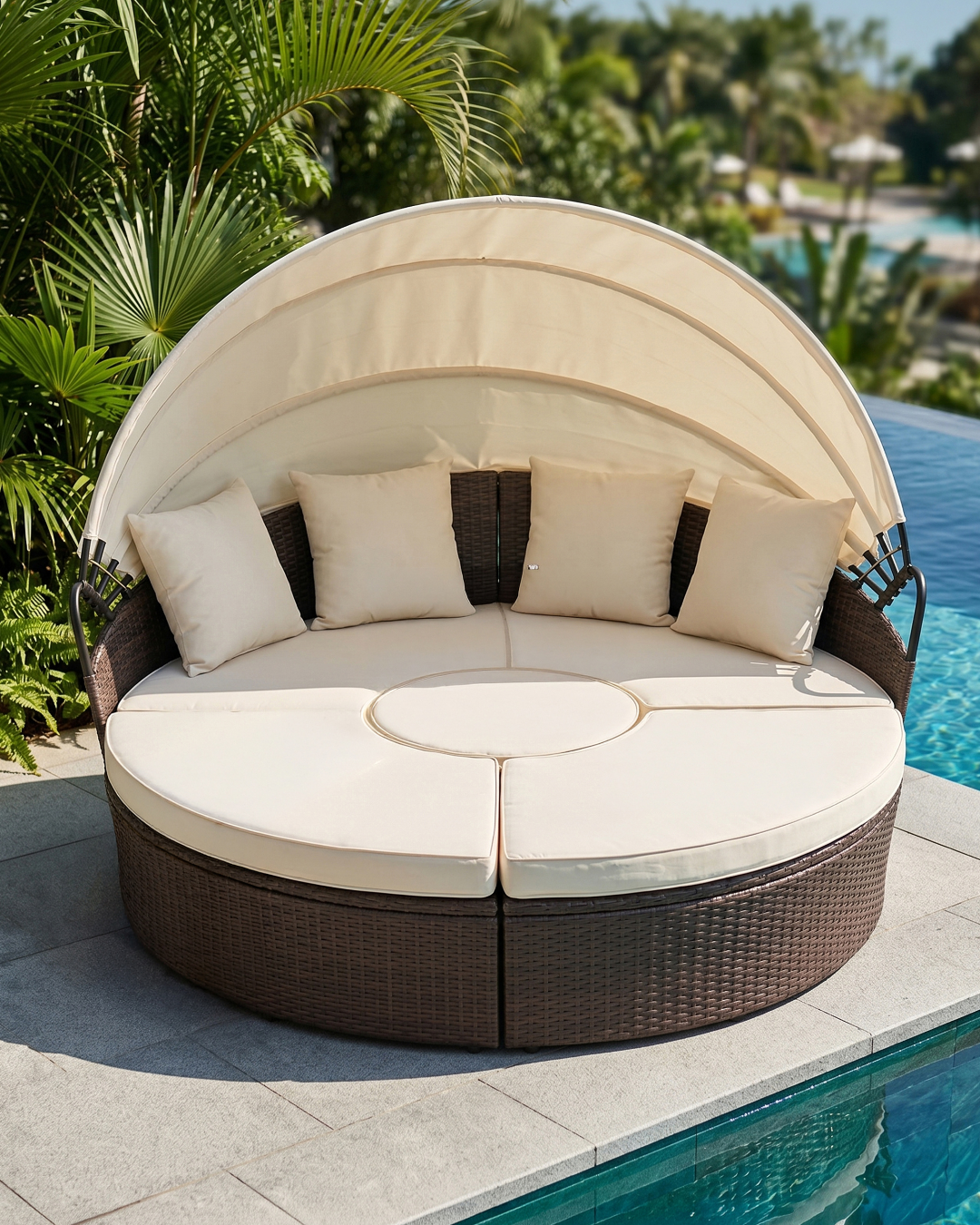 Modular round sofa daybed with canopy by the pool