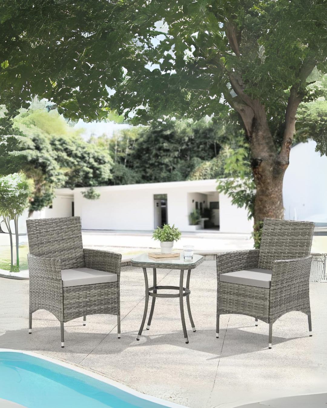 Outdoor patio set with two garden chairs and a side table