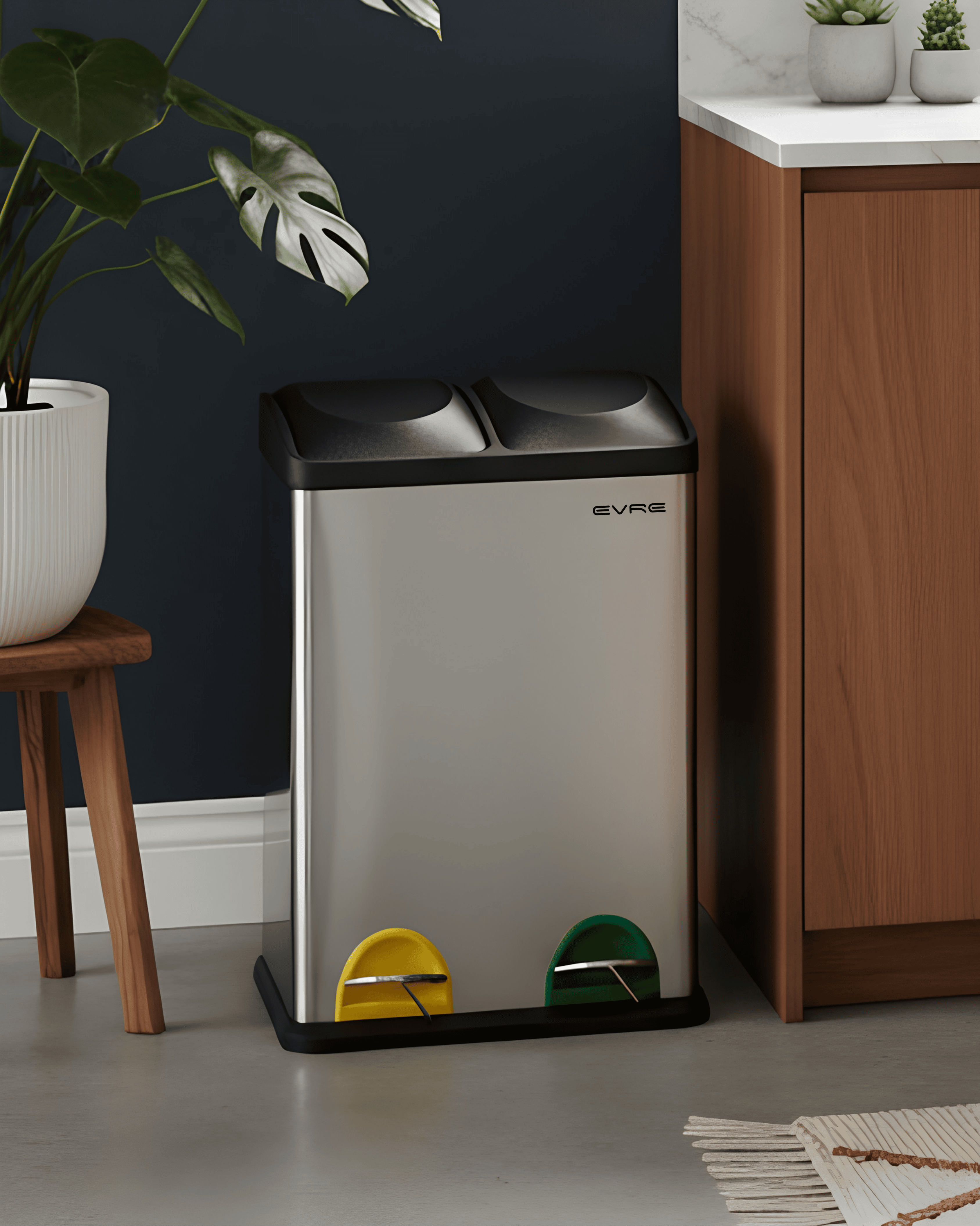 Stainless steel dual compartment bin in a kitchen setting