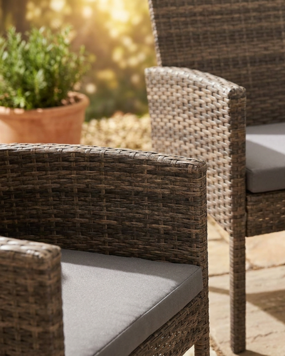 Wicker outdoor furniture with cushions on a patio