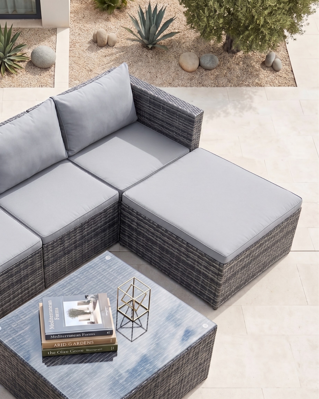Grey rattan garden set with cushions