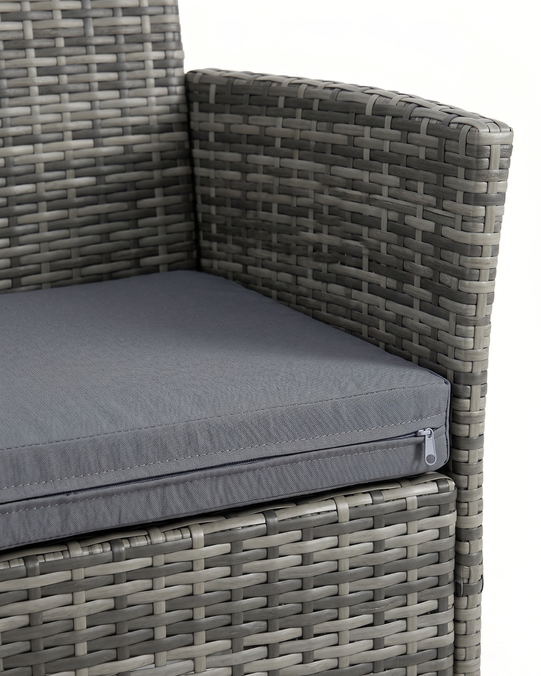 Grey wicker sofa with cushion