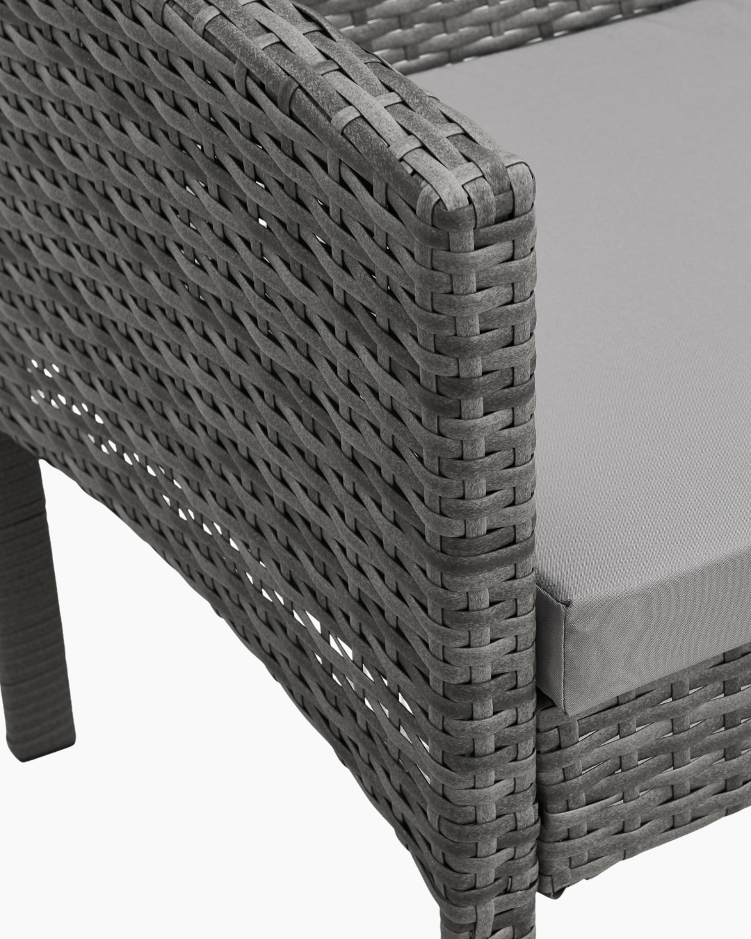 Grey wicker chair with cushion