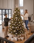 Couple decorating an 8ft large Brunswick Spruce fake Christmas tree