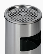 Silver ashtray atop silver cigarette bin