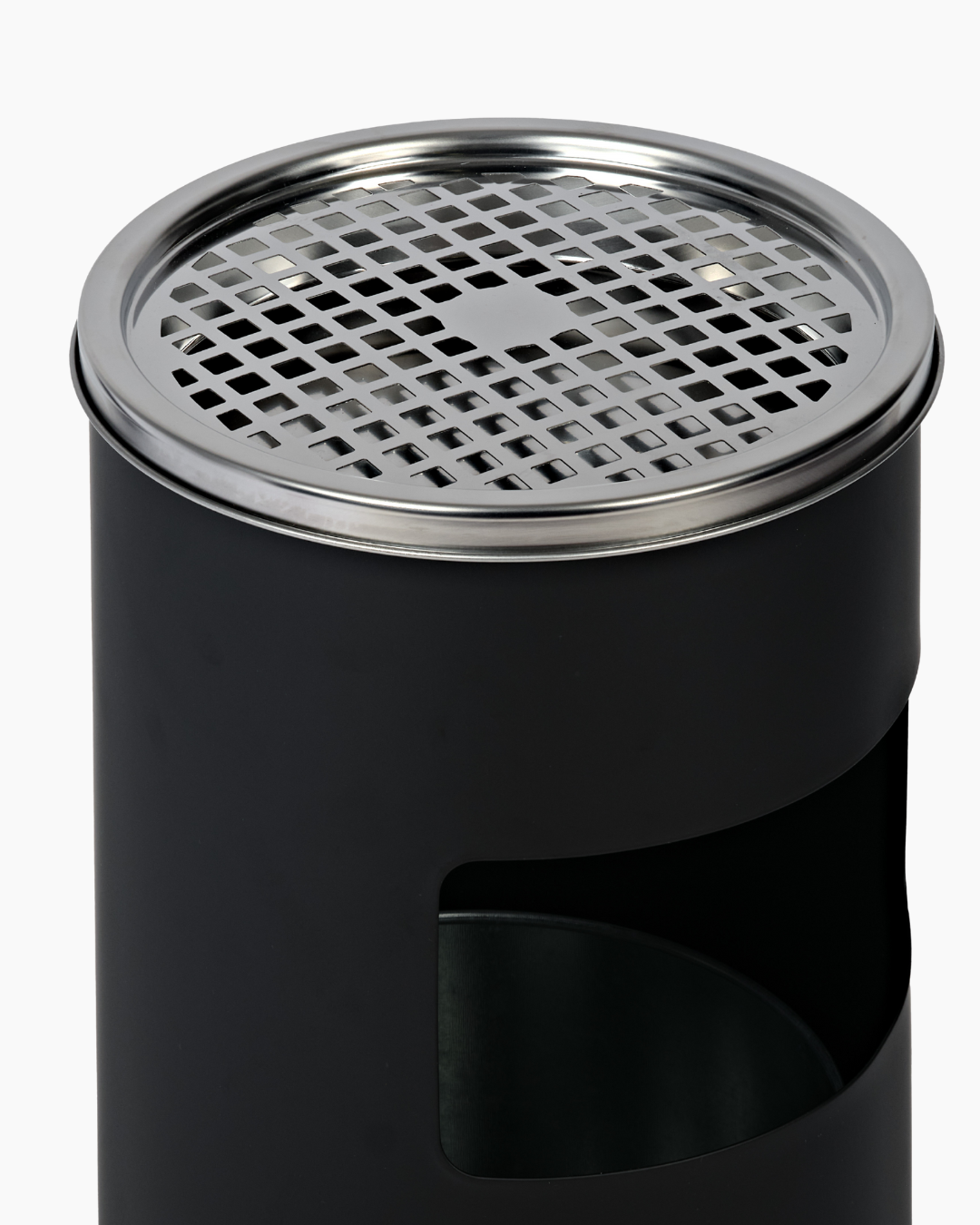 Silver ashtray atop black cigarette bin