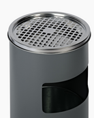 Silver ashtray atop grey cigarette bin