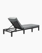 Reclining sun lounger with cushion