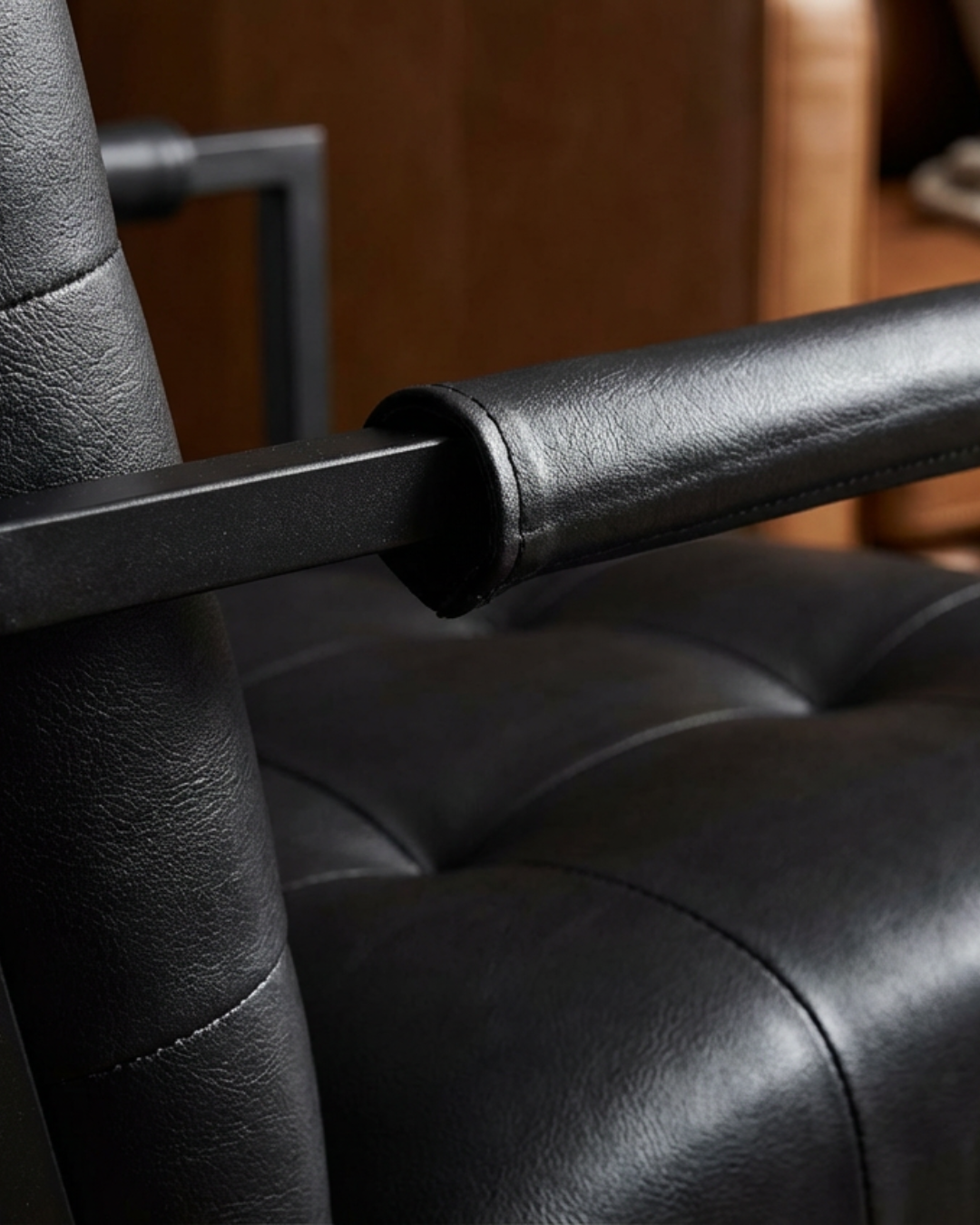 Close-up of a black leather chair
