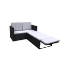 Sectional outdoor sofa with black frame and cream cushions