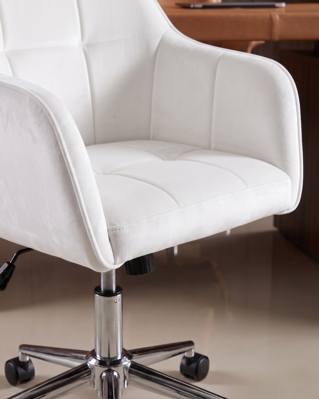 White office chair with close-up on velvet seat