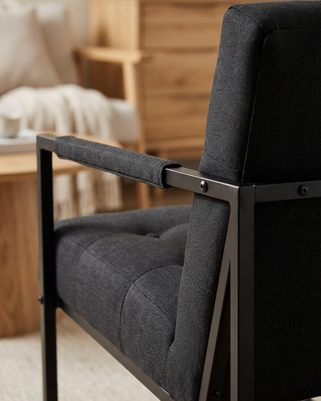 Upholstered grey chair with sled base