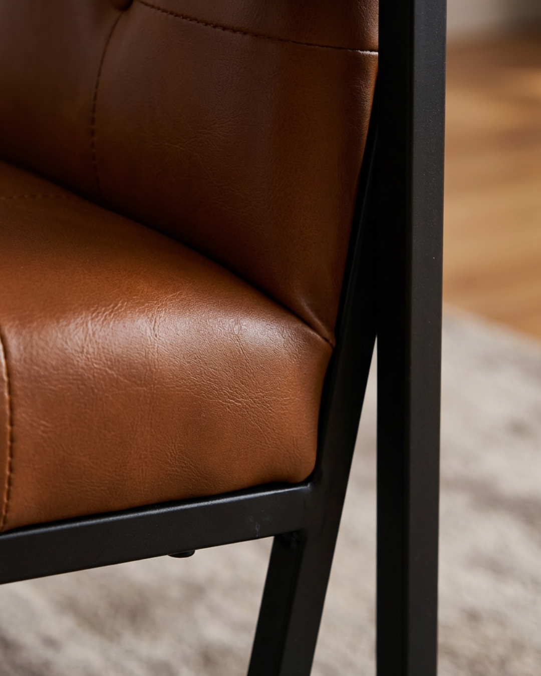 Mid-Century Modern Brown leather chair with black metal frame 