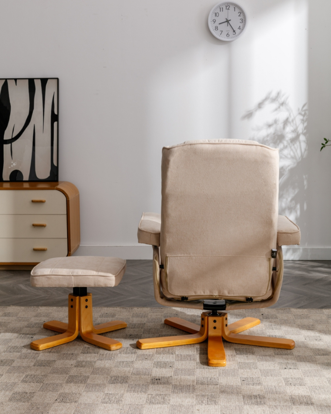 Beige recliner chair with ottoman on carpet