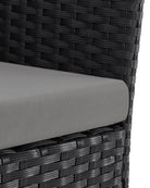 Black wicker garden chair with cushion