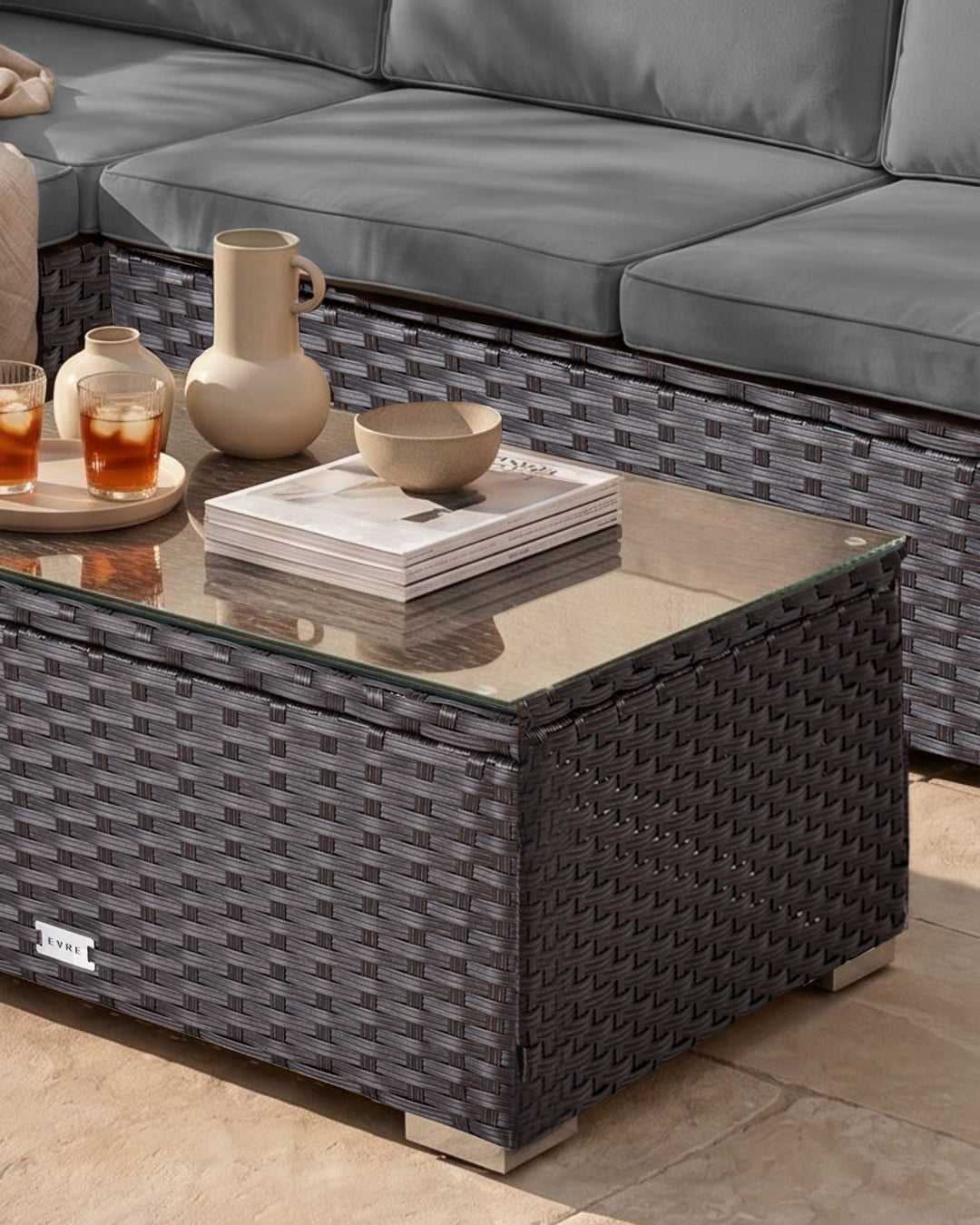 Brown rattan outdoor sofa set with coffee table