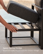 Close-up of a stool being tucked into an armchair