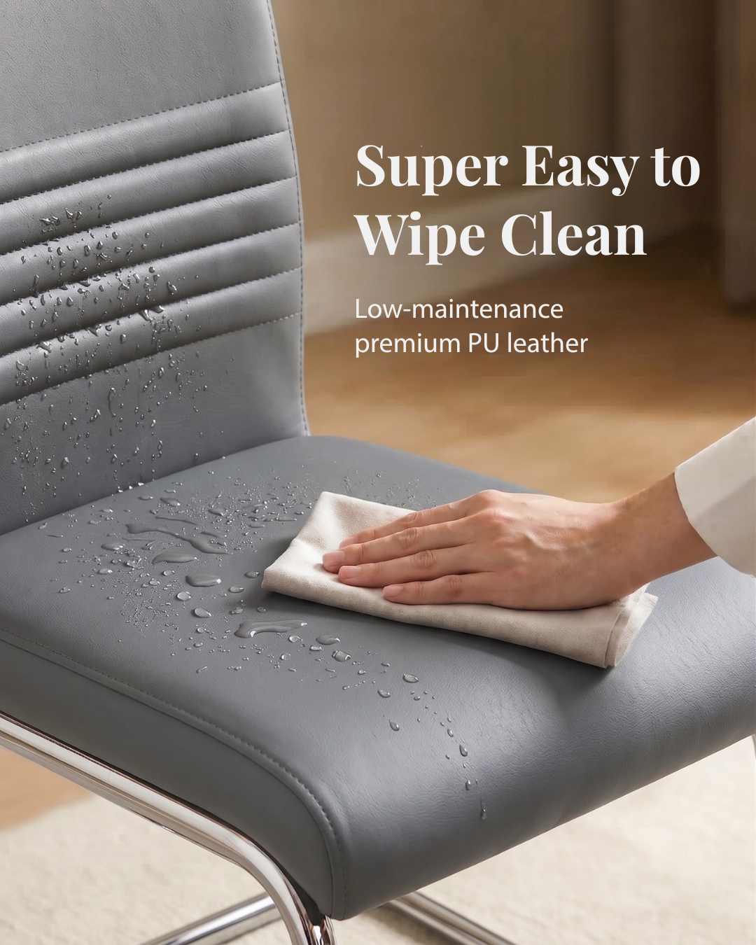 Person cleaning a grey chair with a cloth, emphasising easy maintenance