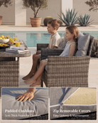 Two children sitting on woven outdoor patio chairs beside a swimming pool