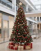 An 8ft Christmas tree decorated with red and gold ornaments as a centrepiece in a shopping mall