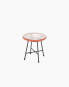 Small round outdoor table with a glass top