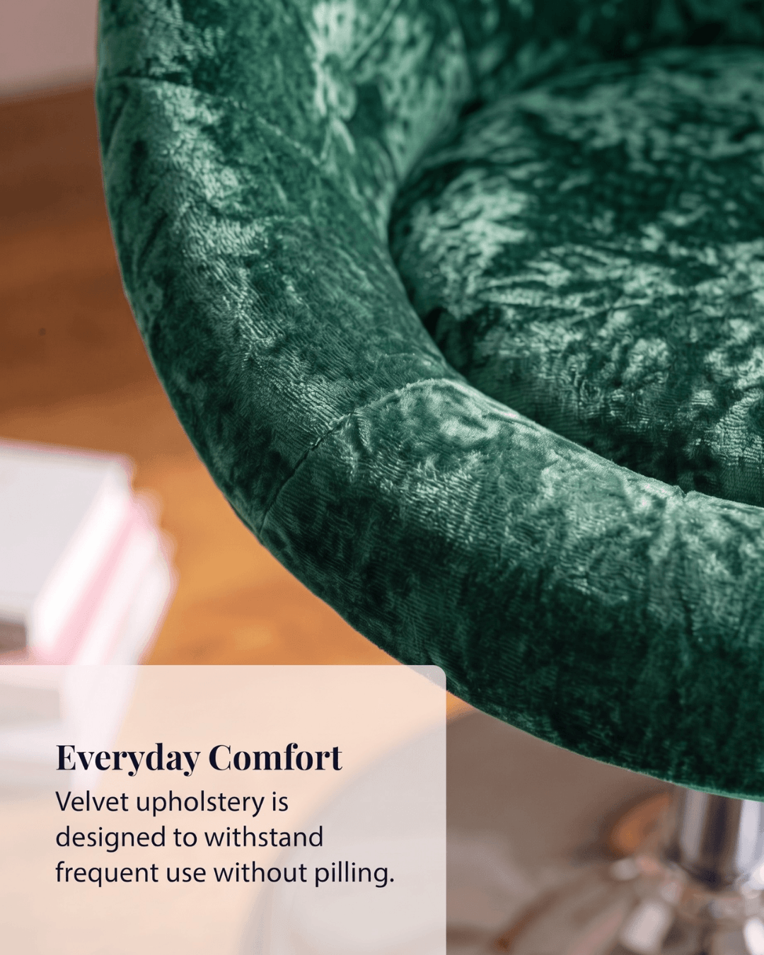 Close-up of a dark green velvet upholstered chair