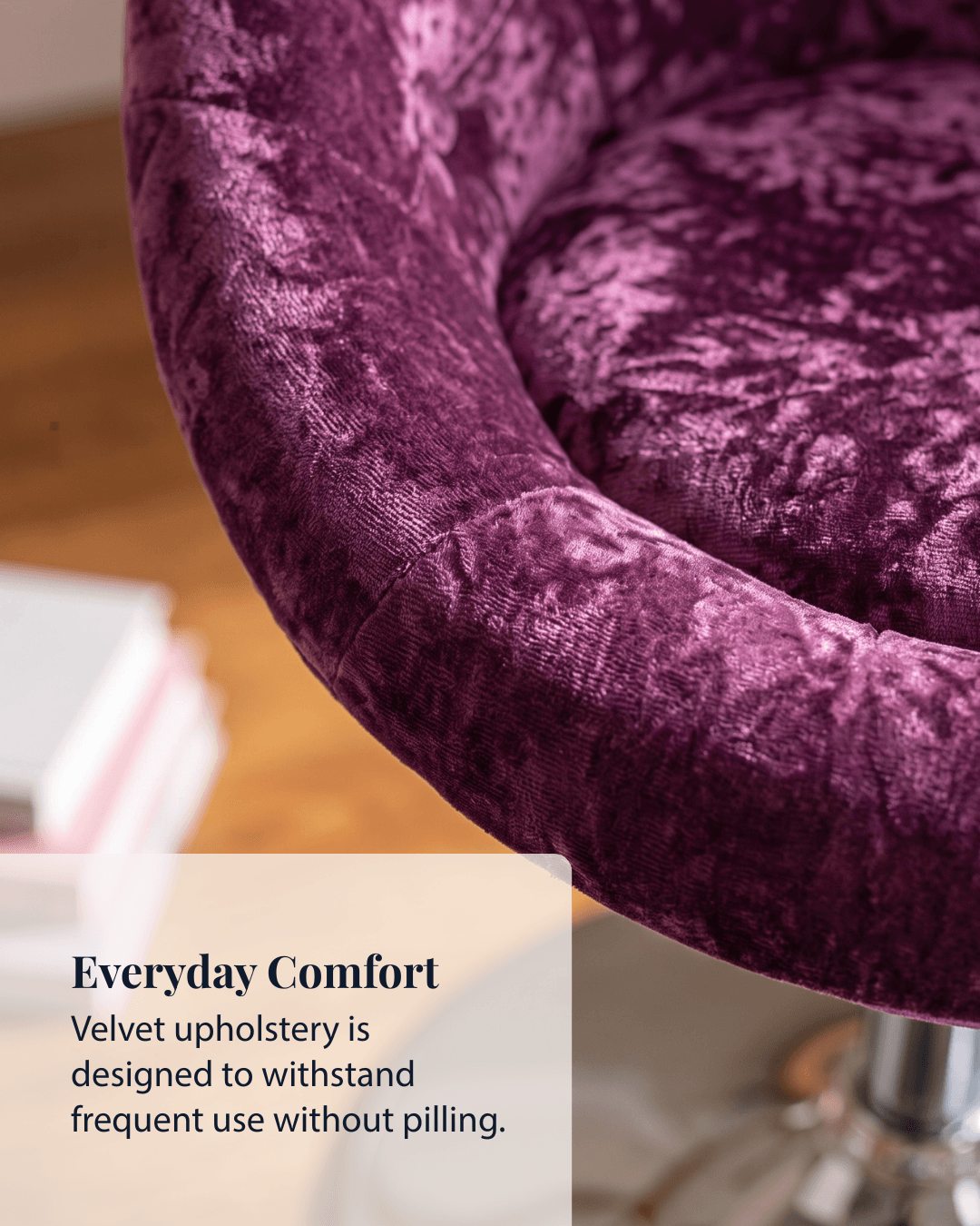 Close-up of a plush pink velvet upholstered chair
