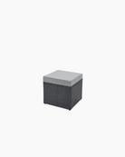 Ottoman with a grey cushion for outdoor use