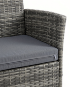 Grey wicker sofa with cushion