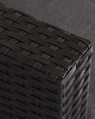 Close-up of a woven rattan sofa