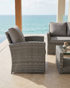 Outdoor patio furniture set with ocean view