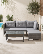 Small garden corner sofa in grey rattan with showerproof cushions