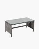 Rectangular grey coffee table with glass top and wicker frame