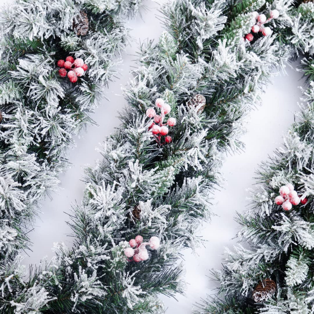 EVRE 9Ft Christmas Garland close up of detailed fir tips and snow