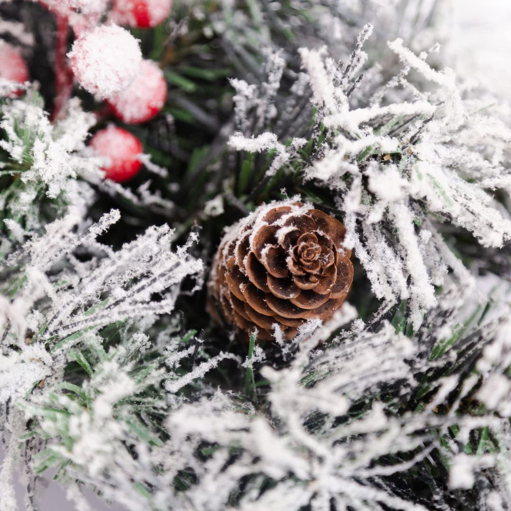 EVRE 9Ft Christmas Garland Close up of detailed pine cones and snow