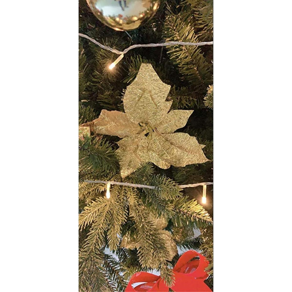 Evre Spruce 5Ft Christmas Tree on close up of gold leaf decoration